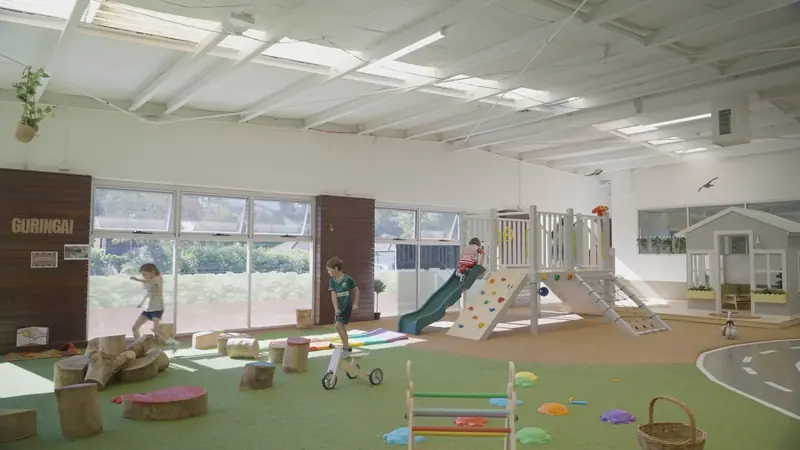 The indoor climbing frame, slide and bike track